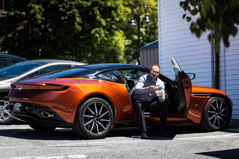 Illustration for article titled Chasing Canada's Greasiest People's Food In A $200,000 Aston Martin